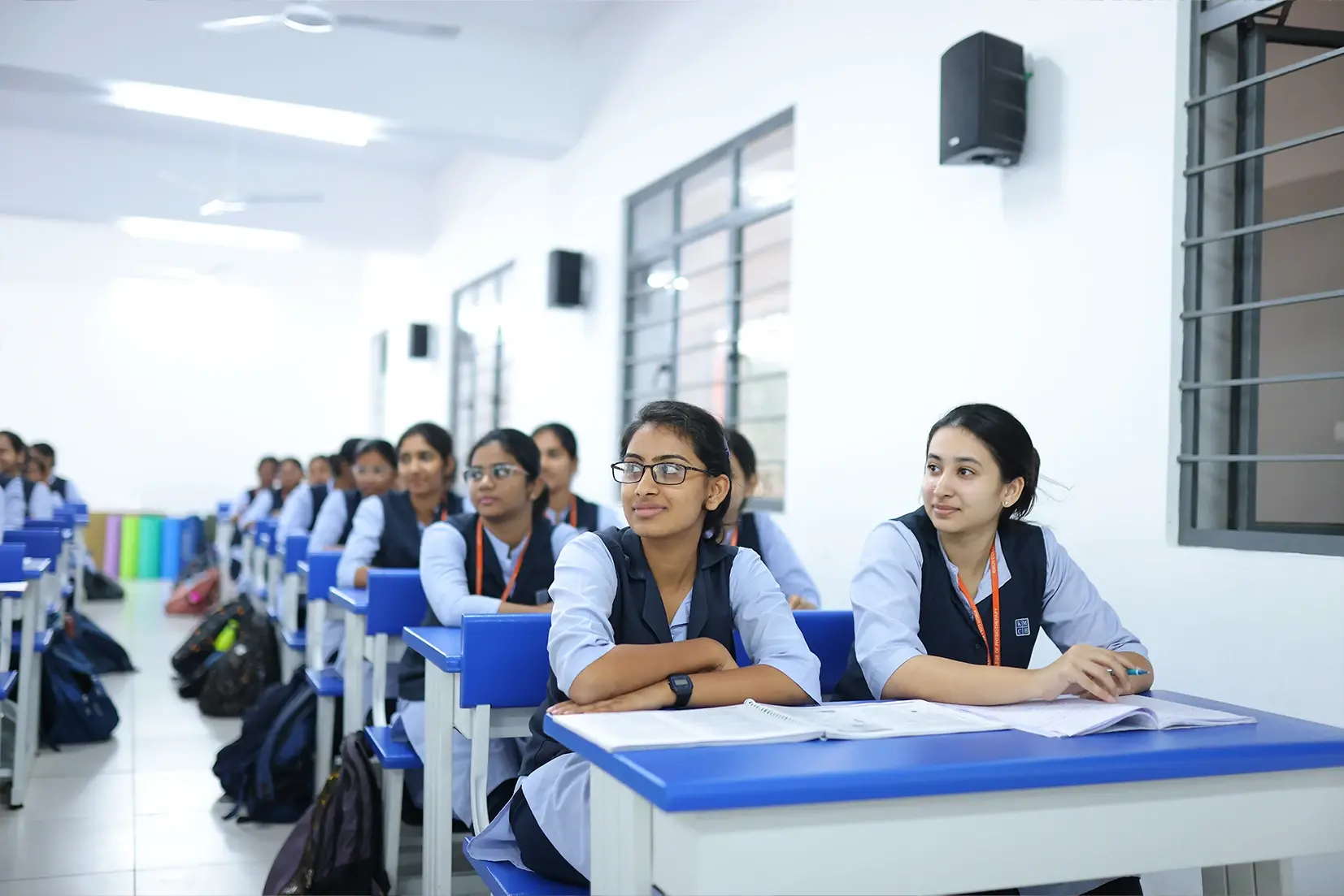 Students outdoors near campus building